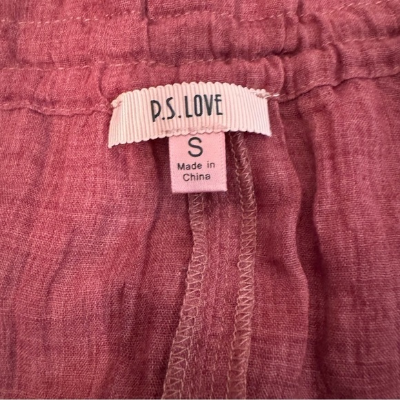 P.S. Love Smocked Cuff Poet Shirt.
NEW. Size Small. Rust/Burgundy Color - Picture 8 of 9